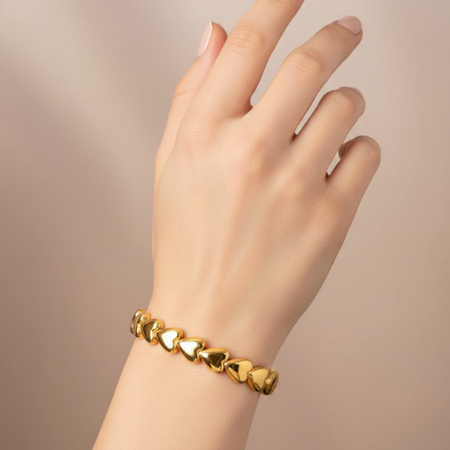 Golden Heart Link Bangle – Bougee Jewels Golden heart link daily wear bangle in gold finish by Bougee Jewels on model