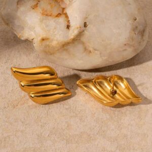 Gold leaf stud earrings with textured nature-inspired design