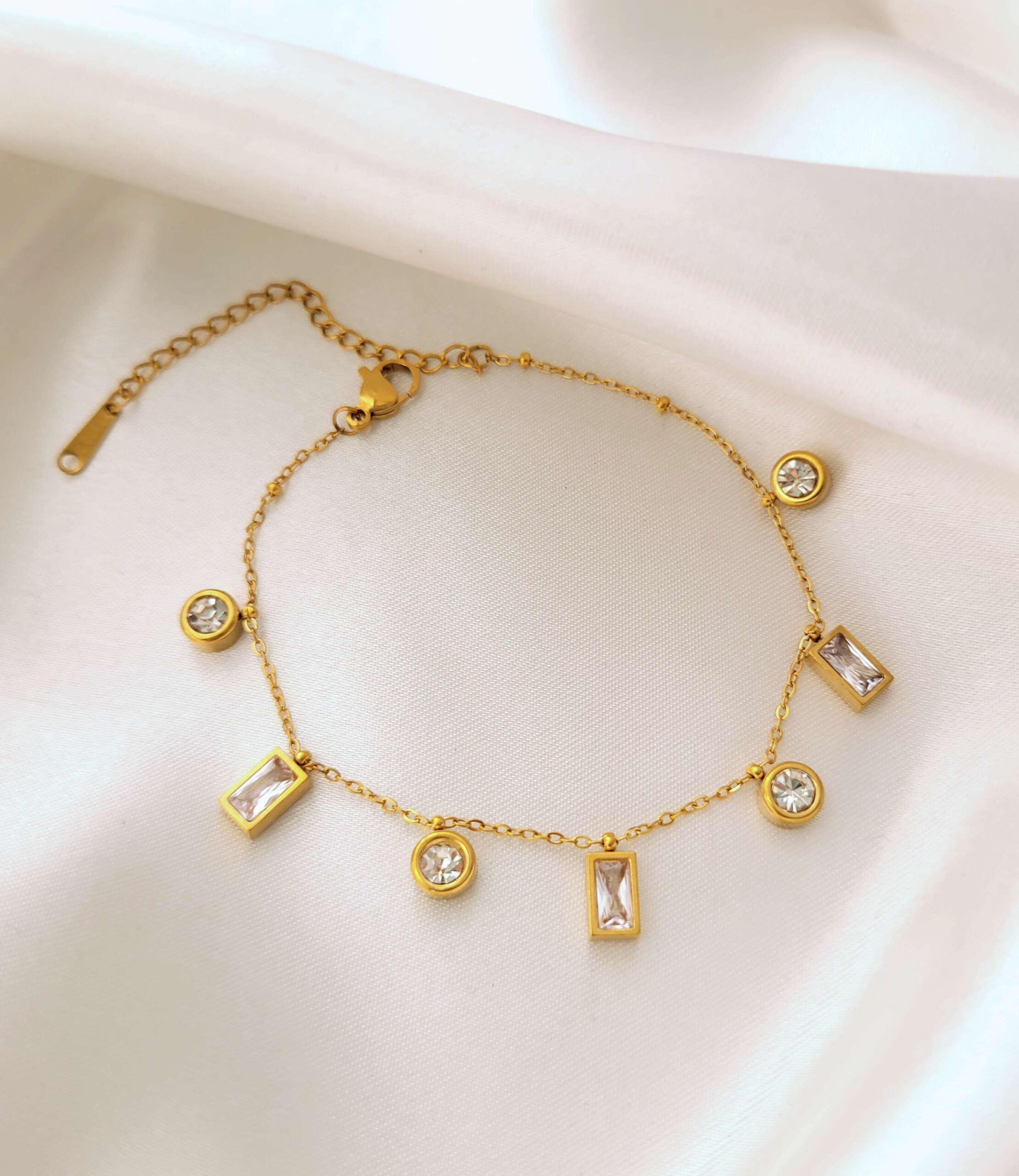 Crystal Drop Bracelet – Bougee Jewels Crystal drop charm bracelet in golden finish by Bougee Jewels