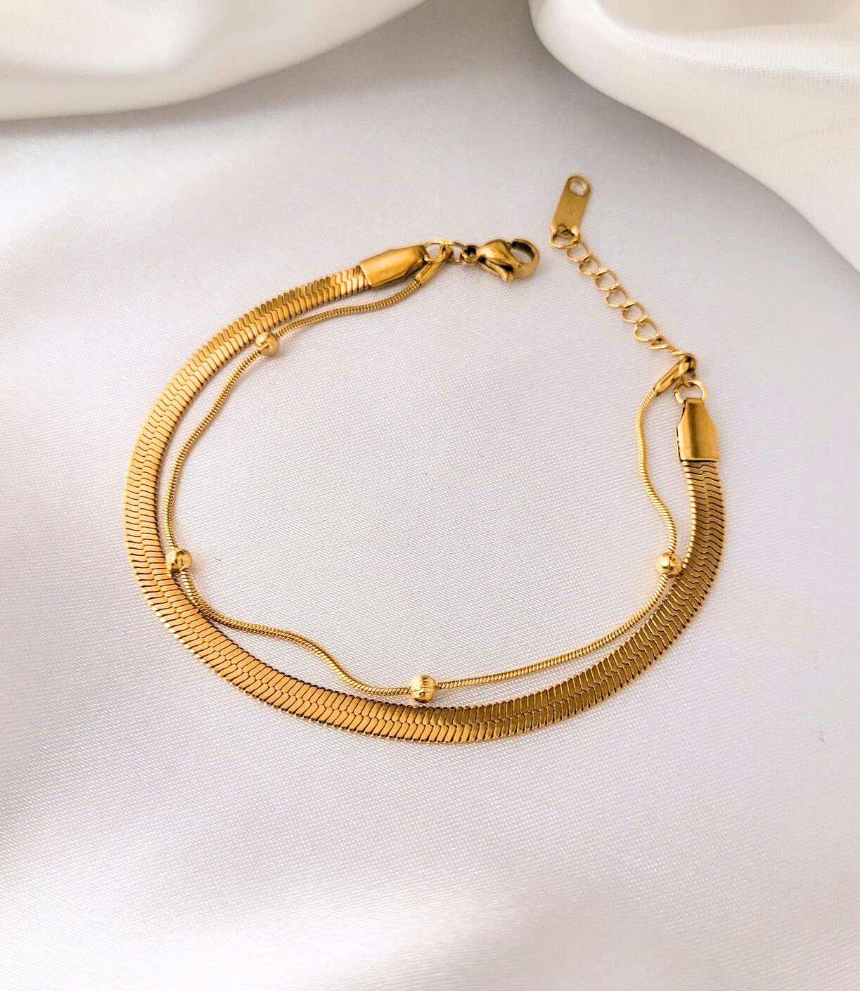Dual Layer Snake Bone Bracelet – Bougee Jewels Dual layer snake bone bracelet with golden finish by Bougee Jewels