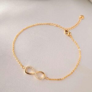 Infinity crystal charm bracelet with golden finish by Bougee Jewels