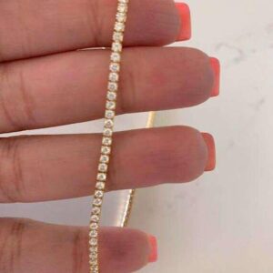 Slim crystal bracelet with golden finish by Bougee Jewels